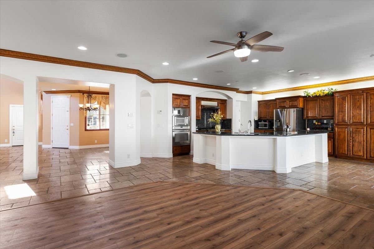 Chandelier, Interior, Kitchen, Recessed Lighting, Stainless Steel Appliances, Wood Texture Flooring