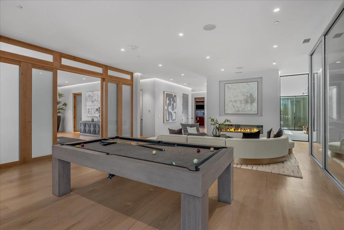 Billiard Table, Fireplace, Game Room, Interior, Living room, Recessed Lighting, Wood Texture Flooring