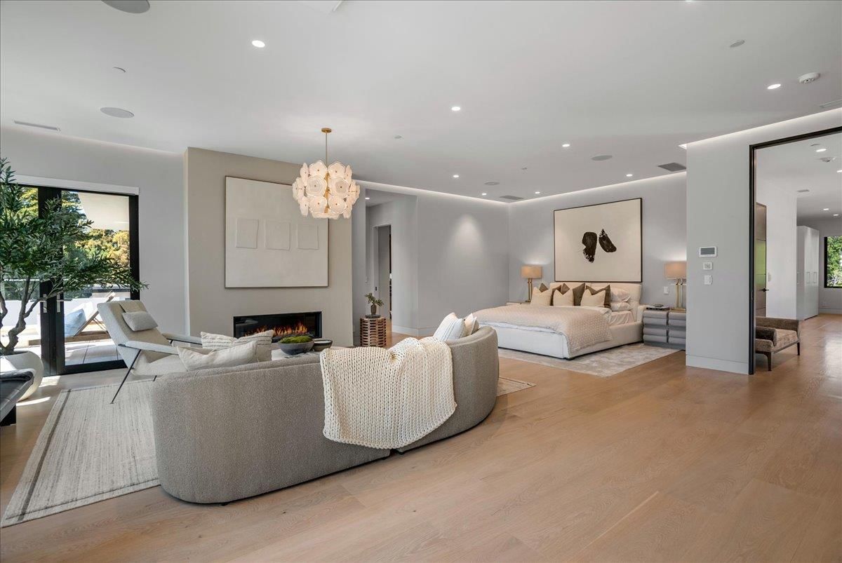 Chandelier, Fireplace, Interior, Living room, Recessed Lighting, Wood Texture Flooring