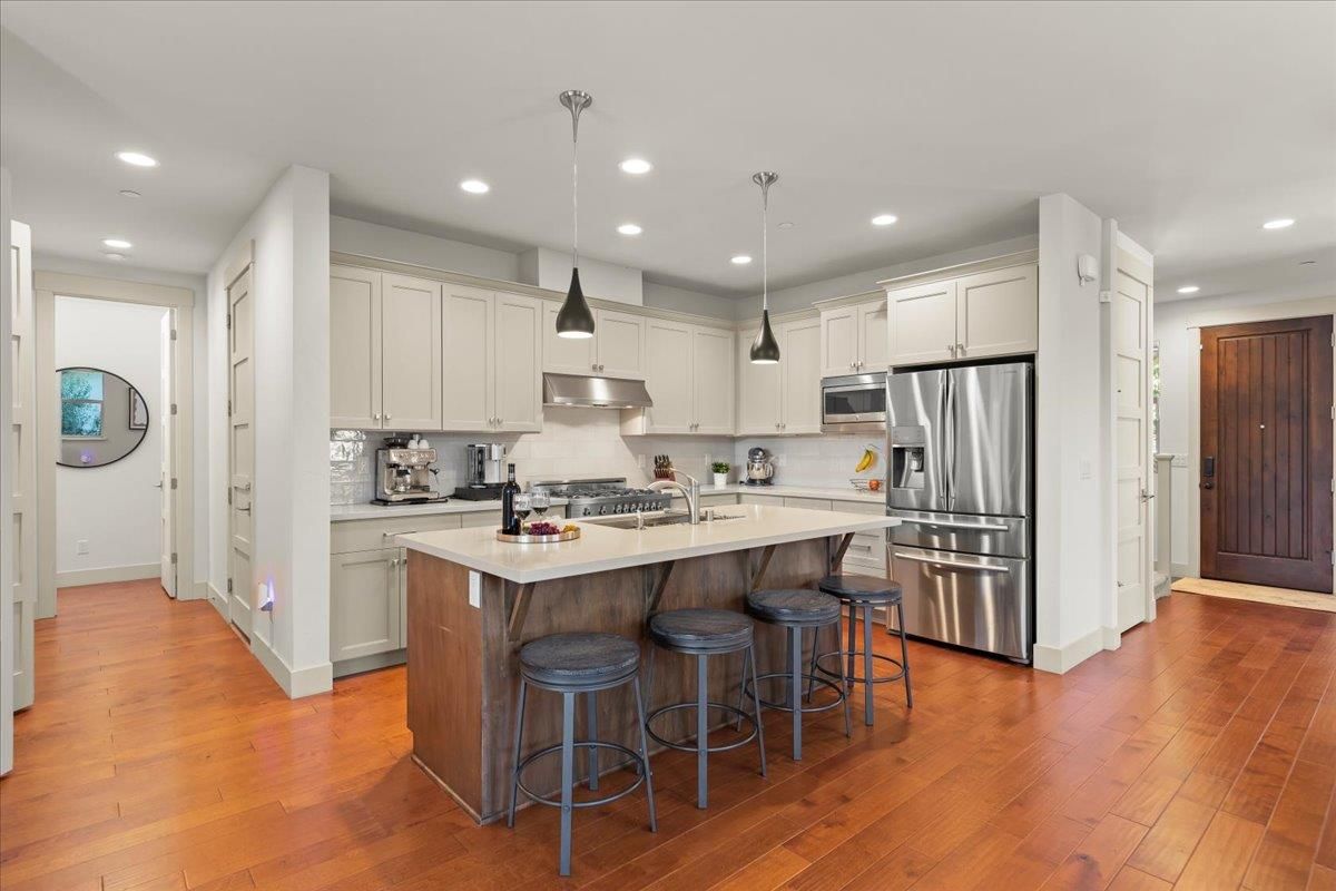 Interior, Kitchen, Pendant Lights, Recessed Lighting, Stainless Steel Appliances, Wood Texture Flooring