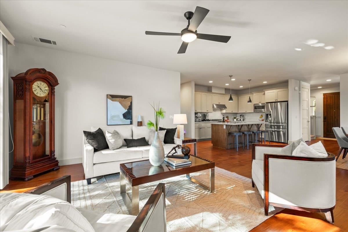 Dining room, Interior, Kitchen, Living room, Recessed Lighting, Stainless Steel Appliances, Wood Texture Flooring