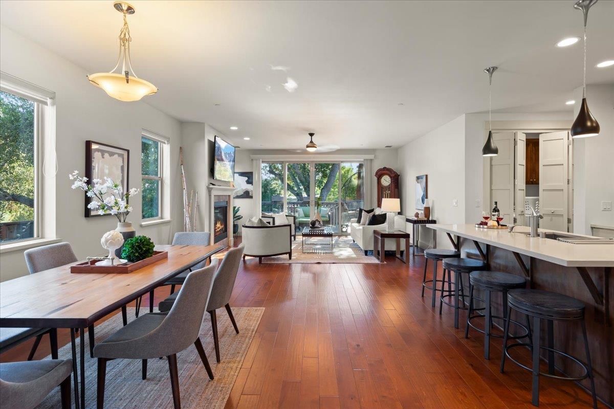 Dining room, Fireplace, Interior, Living room, Pendant Lights, Recessed Lighting, Wood Texture Flooring