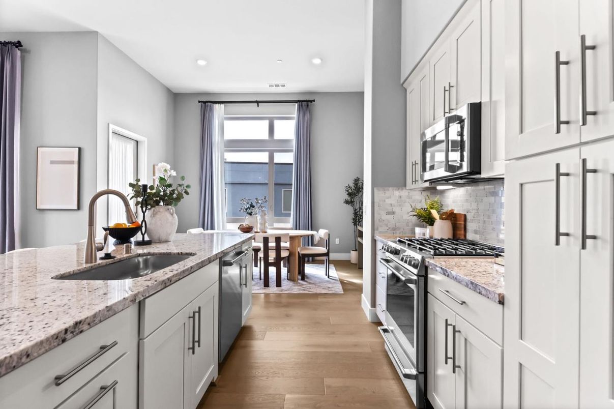 Dining room, Interior, Kitchen, Recessed Lighting, Stainless Steel Appliances, Wood Texture Flooring