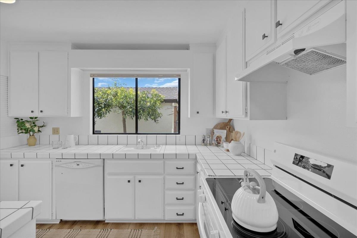 Interior, Kitchen, Tile Countertops, Wood Texture Flooring