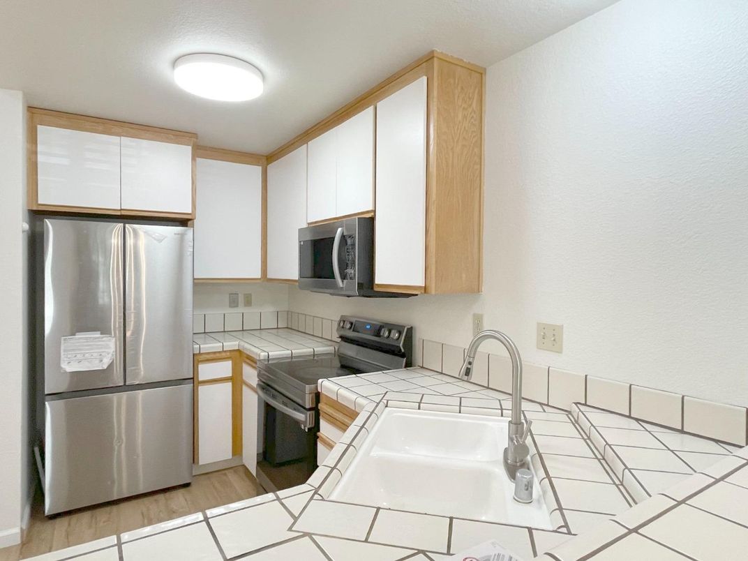 Interior, Kitchen, Tile Countertops, Wood Texture Flooring