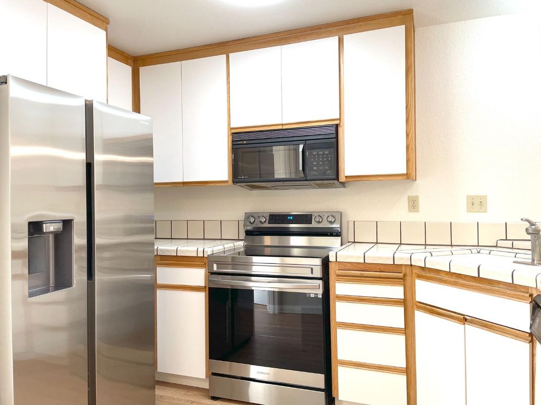 Interior, Kitchen, Stainless Steel Appliances, Tile Countertops, Wood Texture Flooring
