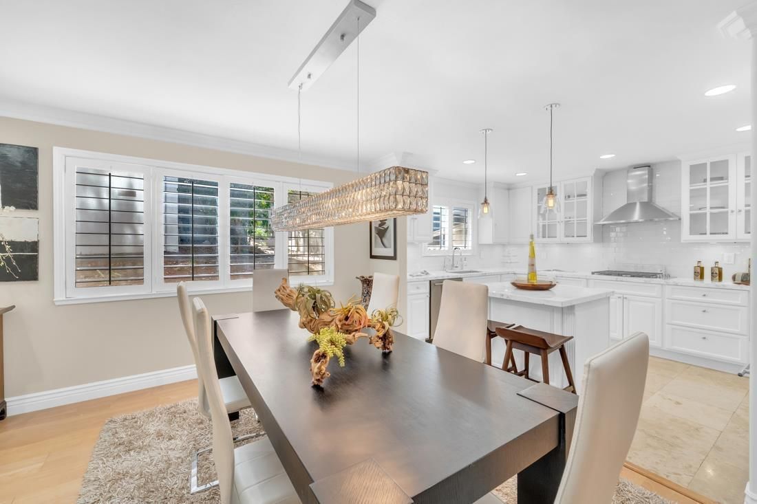 Chandelier, Dining room, Interior, Kitchen, Pendant Lights, Recessed Lighting, Stainless Steel Appliances, Wood Texture Flooring