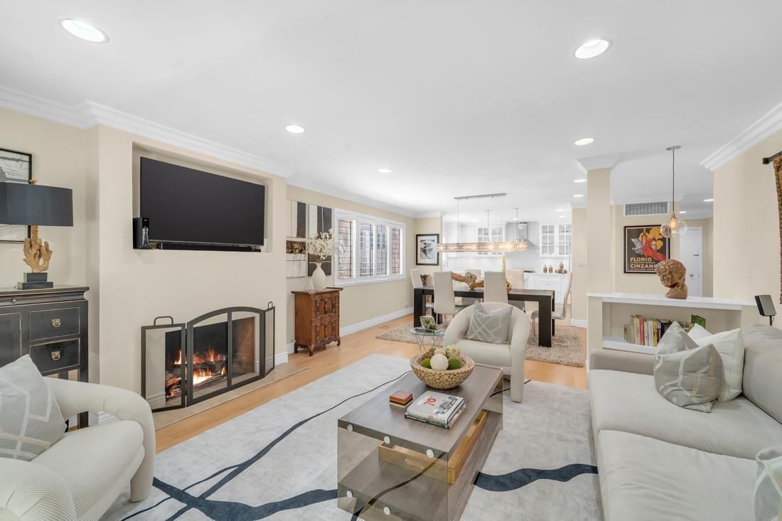 Chandelier, Dining room, Fireplace, Interior, Living room, Pendant Lights, Recessed Lighting, Wood Texture Flooring