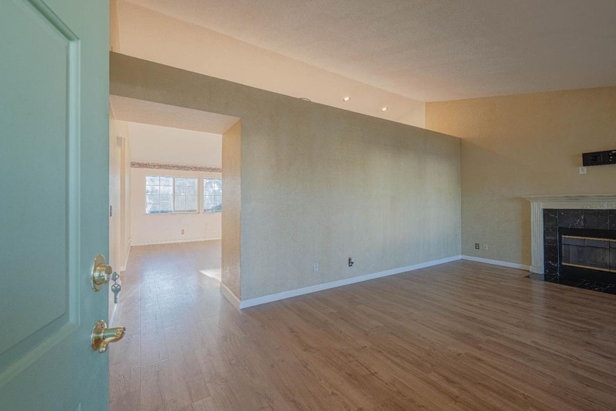 Empty room, Fireplace, Interior, Recessed Lighting, Wood Texture Flooring