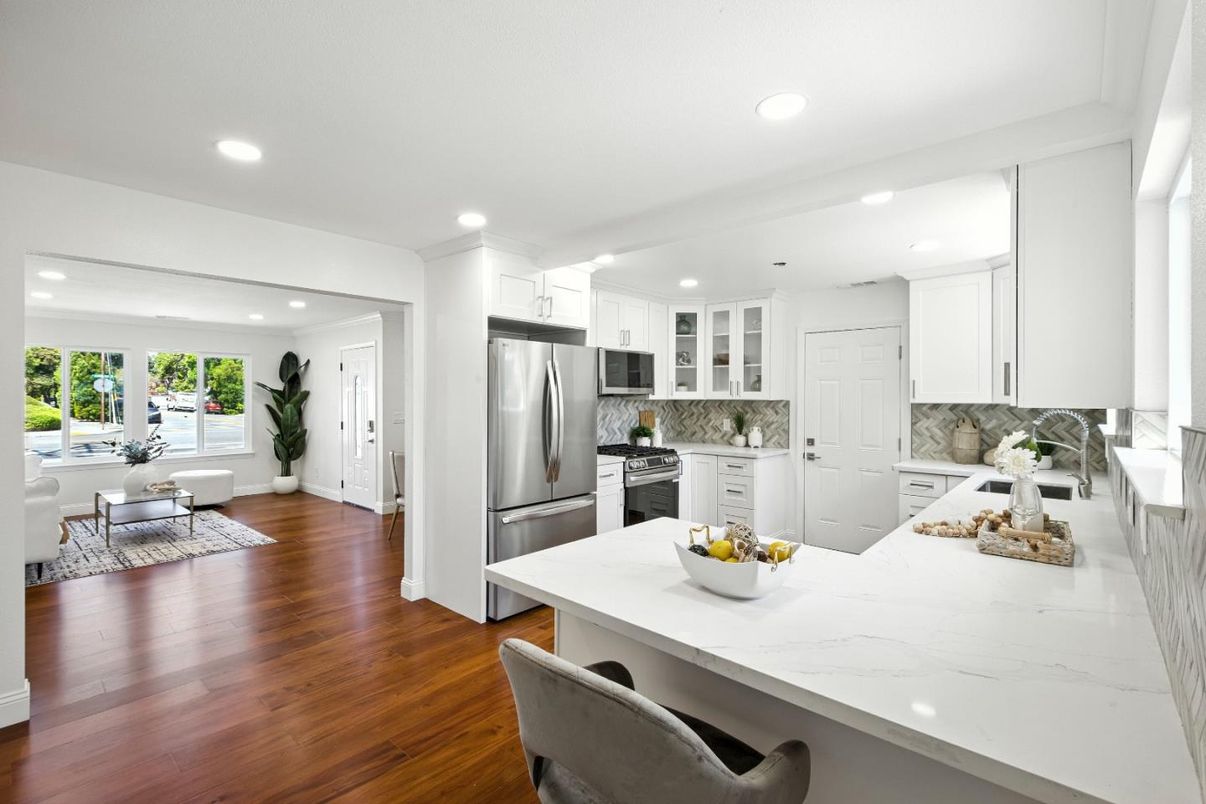 Dining room, Interior, Kitchen, Recessed Lighting, Stainless Steel Appliances, Wood Texture Flooring
