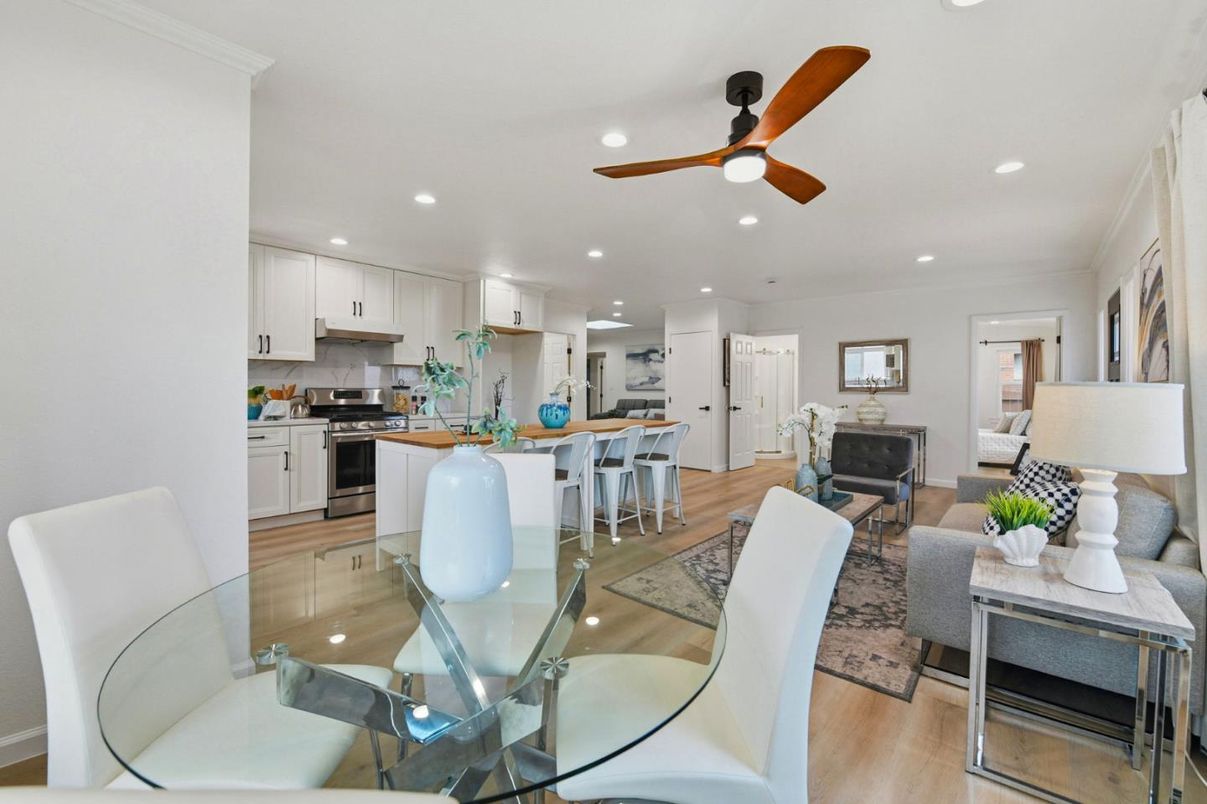 Dining room, Interior, Kitchen, Living room, Recessed Lighting, Stainless Steel Appliances, Wood Texture Flooring