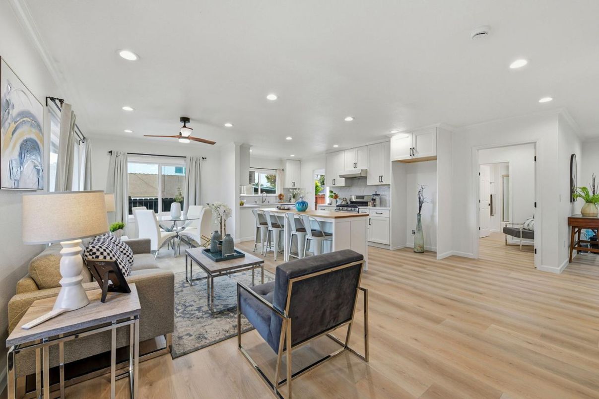 Dining room, Interior, Kitchen, Living room, Recessed Lighting, Stainless Steel Appliances, Wood Texture Flooring