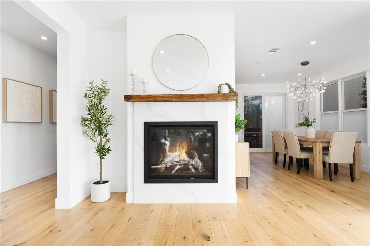 Dining room, Fireplace, Interior, Pendant Lights, Recessed Lighting, Wood Texture Flooring