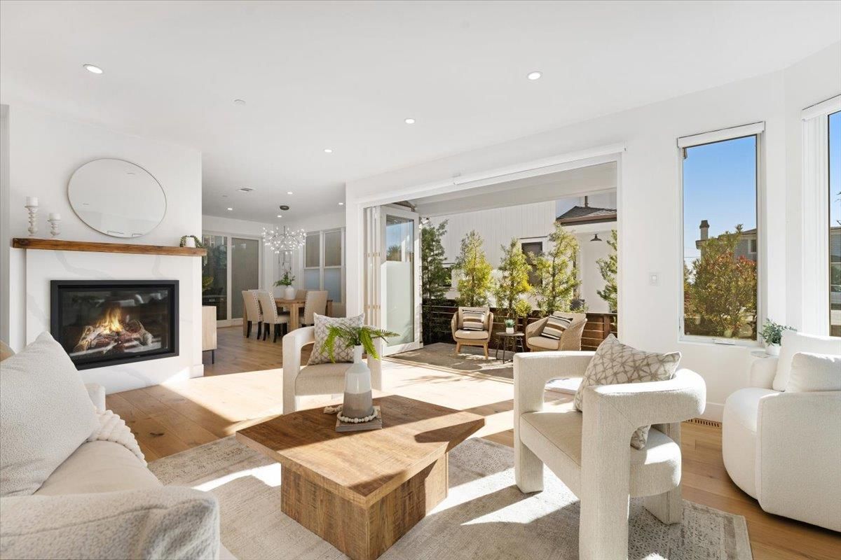 Chandelier, Dining room, Fireplace, Interior, Living room, Recessed Lighting, Wood Texture Flooring