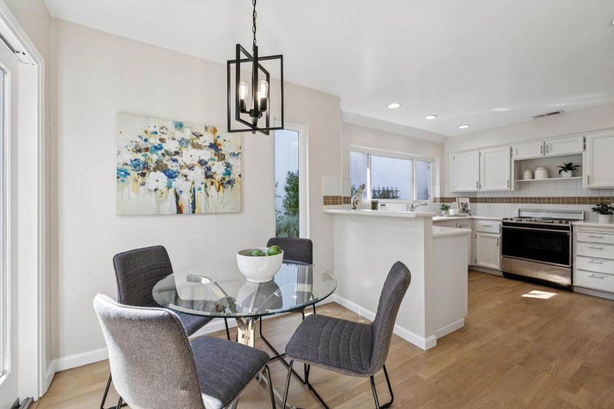Dining room, Interior, Kitchen, Pendant Lights, Recessed Lighting, Stainless Steel Appliances, Wood Texture Flooring