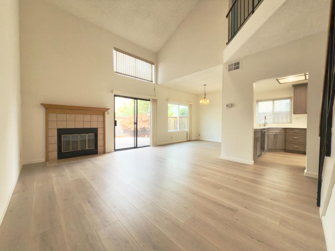 Chandelier, Empty room, Fireplace, Interior, Pendant Lights, Wood Texture Flooring