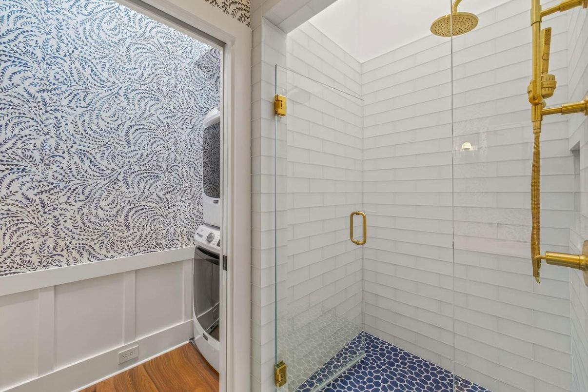 Bathroom, Glass Shower, Interior, Washer, Wood Texture Flooring