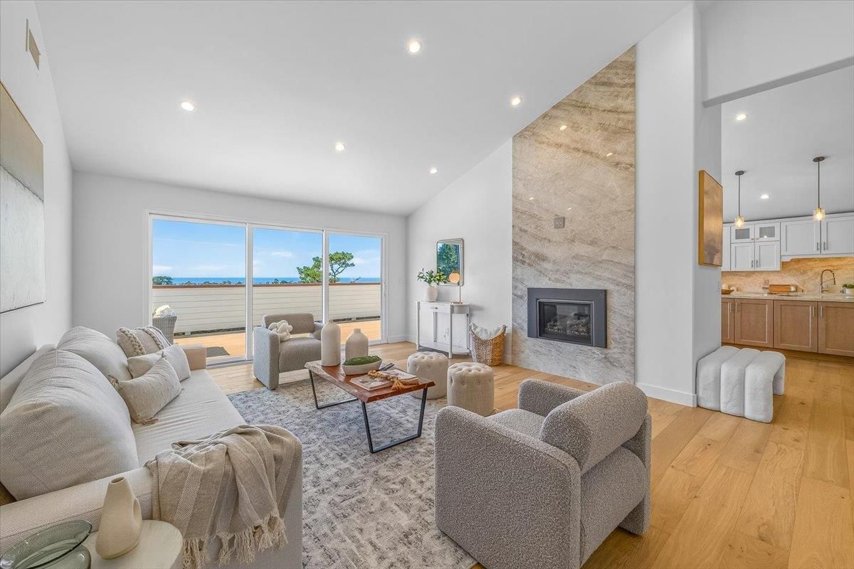 Fireplace, Interior, Living room, Pendant Lights, Recessed Lighting, Water, Wood Texture Flooring