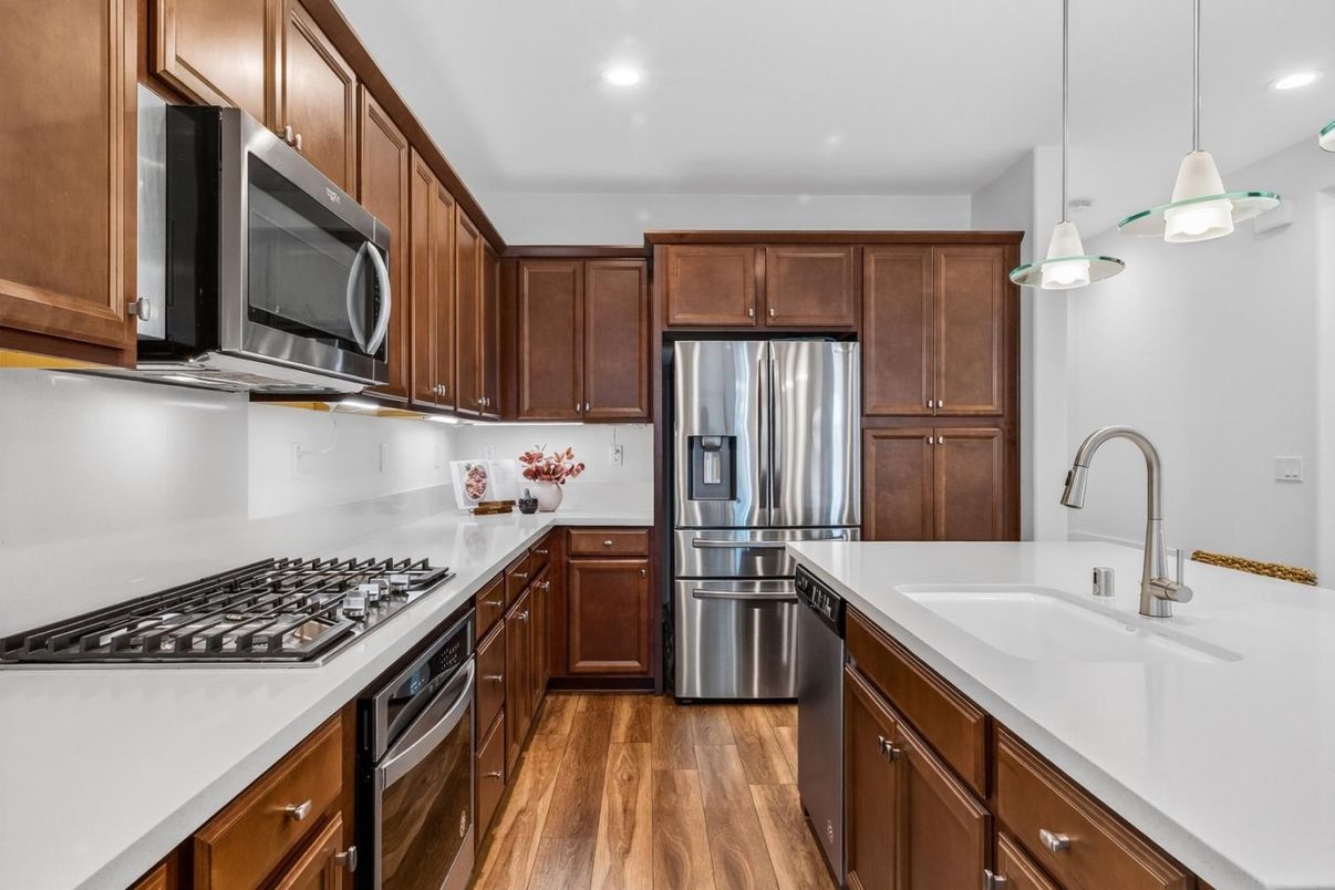 Interior, Kitchen, Pendant Lights, Recessed Lighting, Stainless Steel Appliances, Wood Texture Flooring