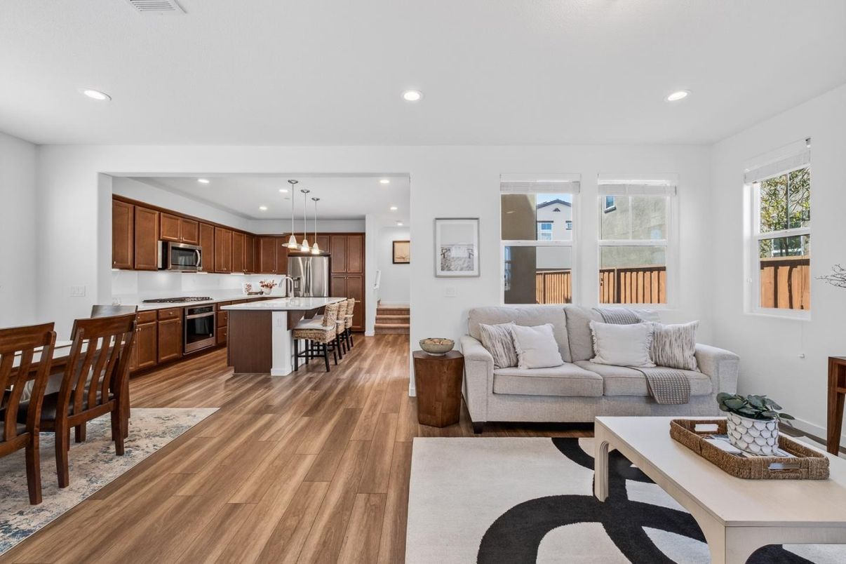 Dining room, Interior, Kitchen, Living room, Pendant Lights, Recessed Lighting, Stainless Steel Appliances, Wood Texture Flooring