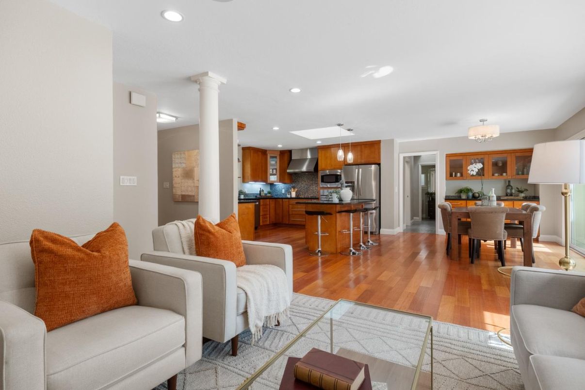 Chandelier, Dining room, Interior, Kitchen, Living room, Pendant Lights, Recessed Lighting, Stainless Steel Appliances, Wood Texture Flooring