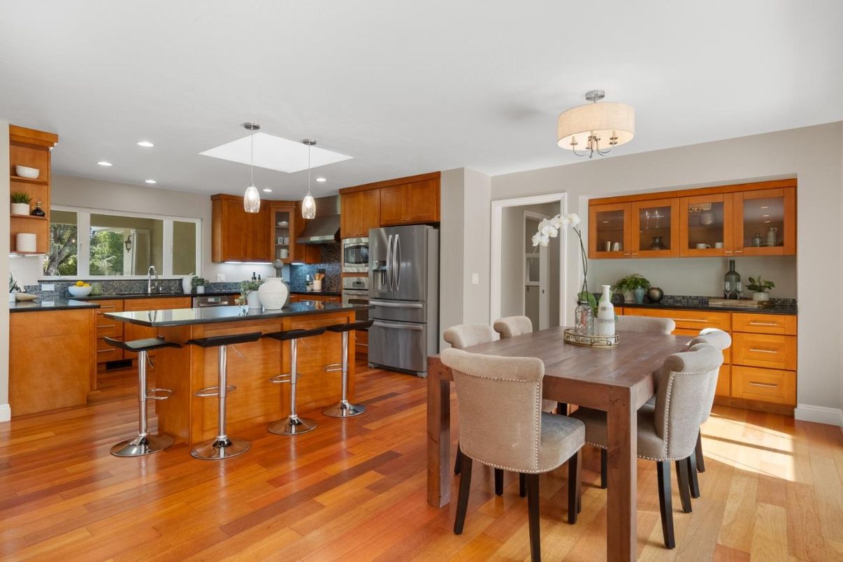 Dining room, Interior, Kitchen, Pendant Lights, Recessed Lighting, Stainless Steel Appliances, Wood Texture Flooring