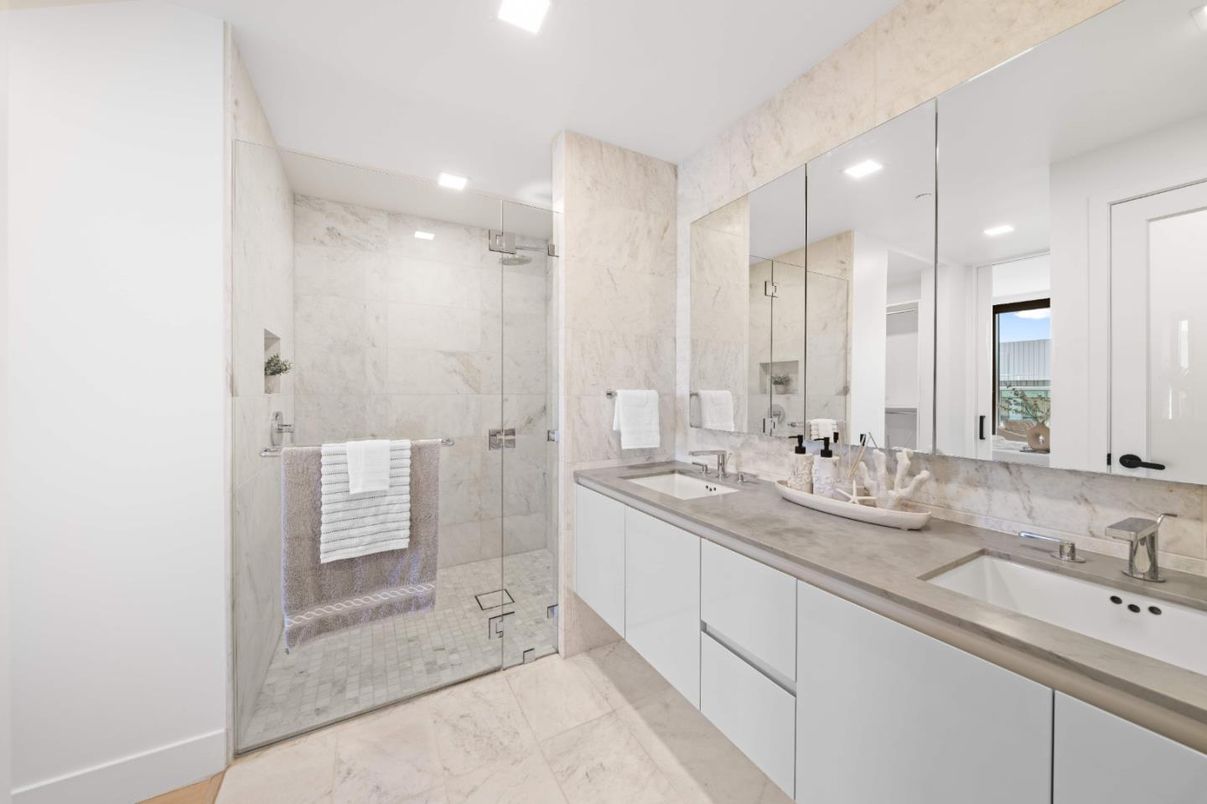 Bathroom, Dual Sink Vanities, Glass Shower, Interior, Marble, Marble Walls, Recessed Lighting