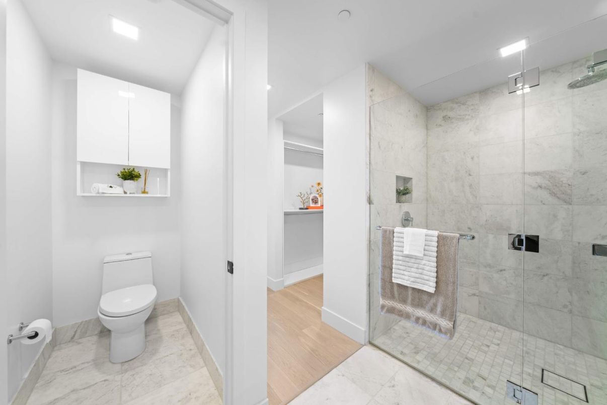 Bathroom, Glass Shower, Interior, Marble, Marble Walls, Recessed Lighting, Wood Texture Flooring