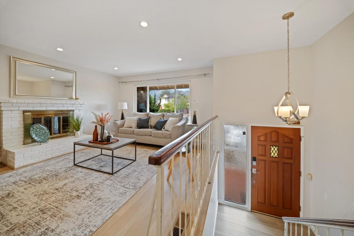 Fireplace, Interior, Living room, Pendant Lights, Recessed Lighting, Stone Walls, Wood Texture Flooring