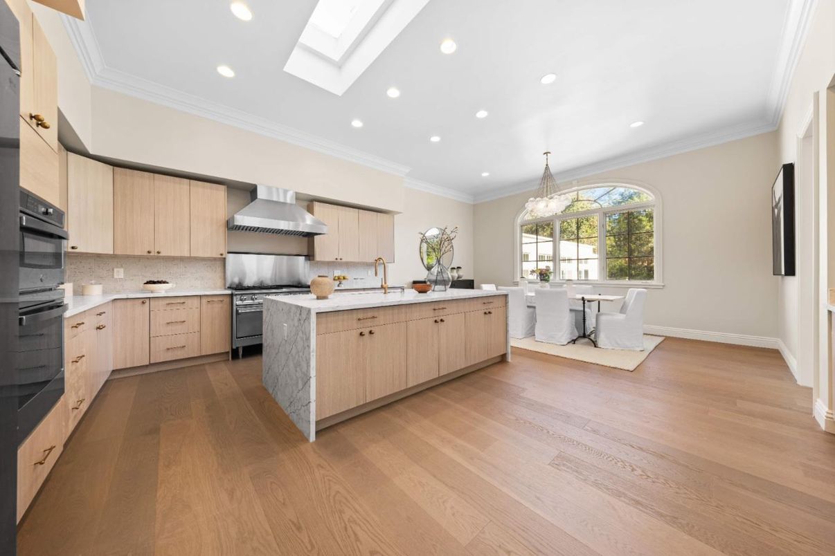 Chandelier, Dining room, Interior, Kitchen, Pendant Lights, Recessed Lighting, Stainless Steel Appliances, Wood Texture Flooring