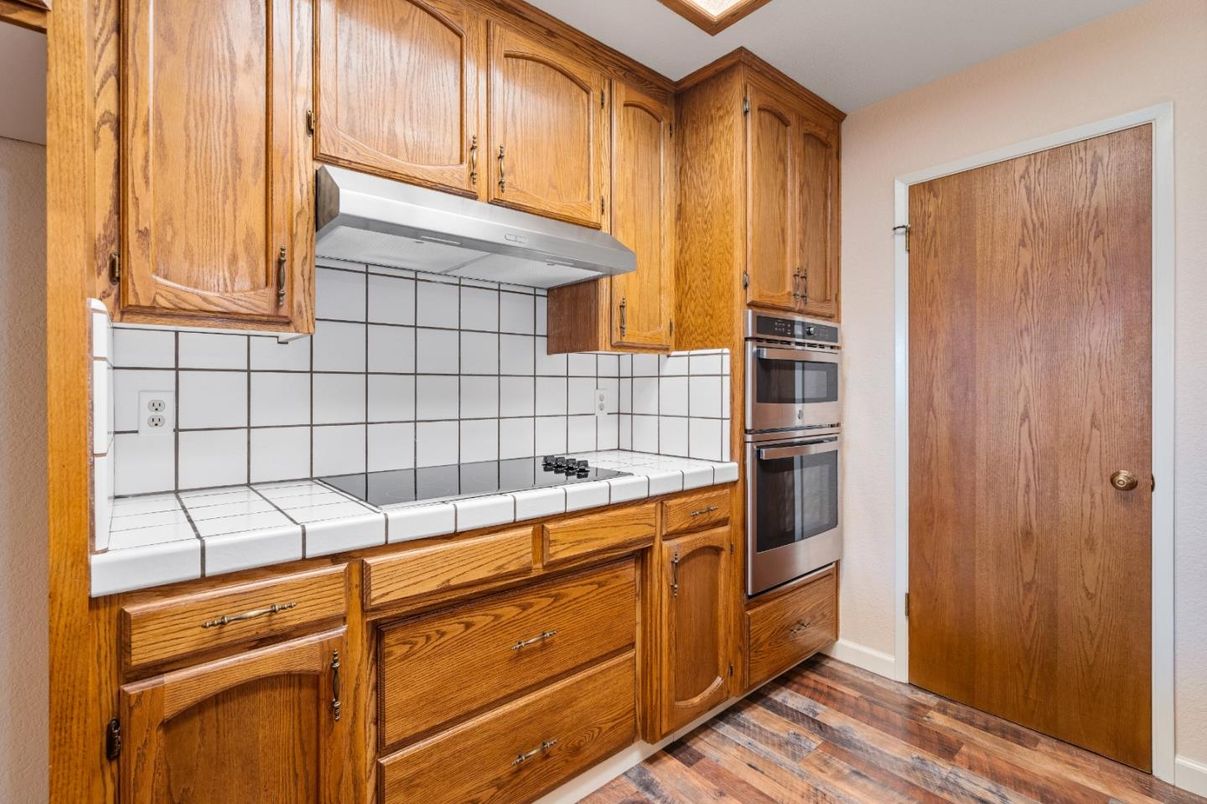 Interior, Kitchen, Tile Countertops, Wood Texture Flooring