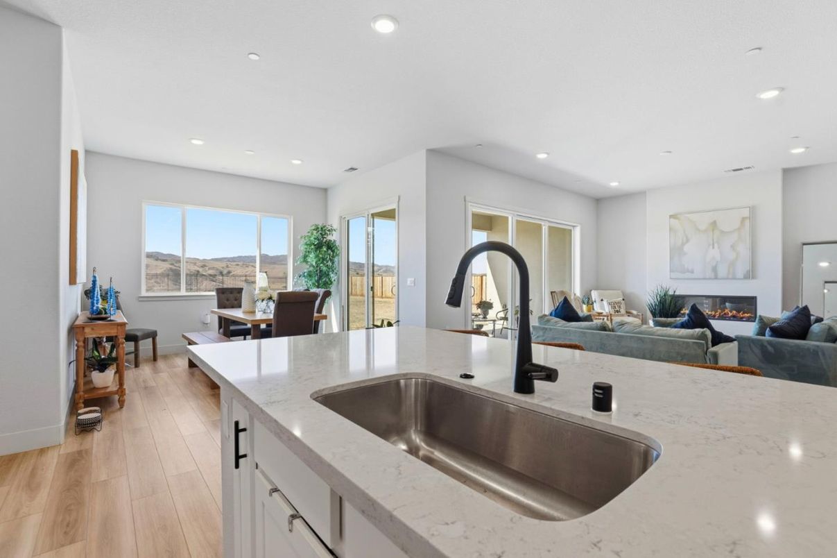 Dining room, Fireplace, Interior, Kitchen, Living room, Recessed Lighting, Wood Texture Flooring