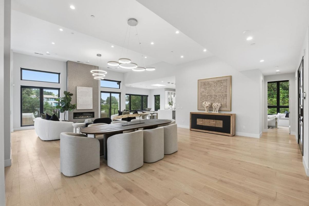 Dining room, Fireplace, Interior, Living room, Pendant Lights, Recessed Lighting, Wood Texture Flooring