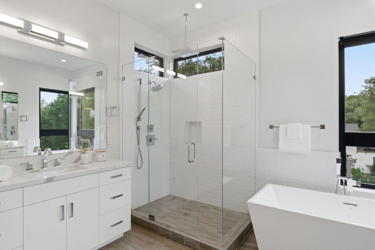 Bathroom, Dual Sink Vanities, Free Standing Baths, Glass Shower, Interior, Recessed Lighting, Wood Texture Flooring