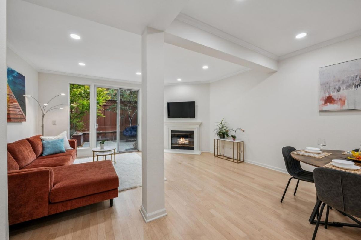Dining room, Fireplace, Interior, Living room, Recessed Lighting, Wood Texture Flooring