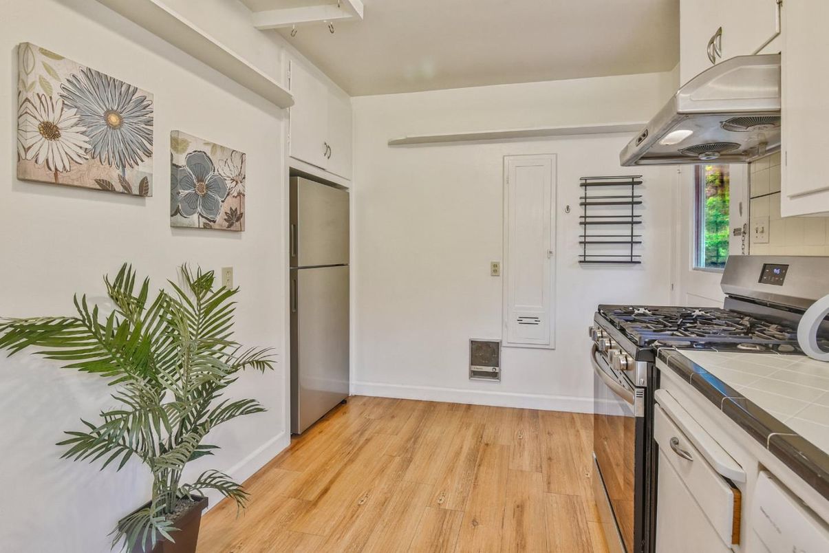 Interior, Kitchen, Tile Countertops, Wood Texture Flooring