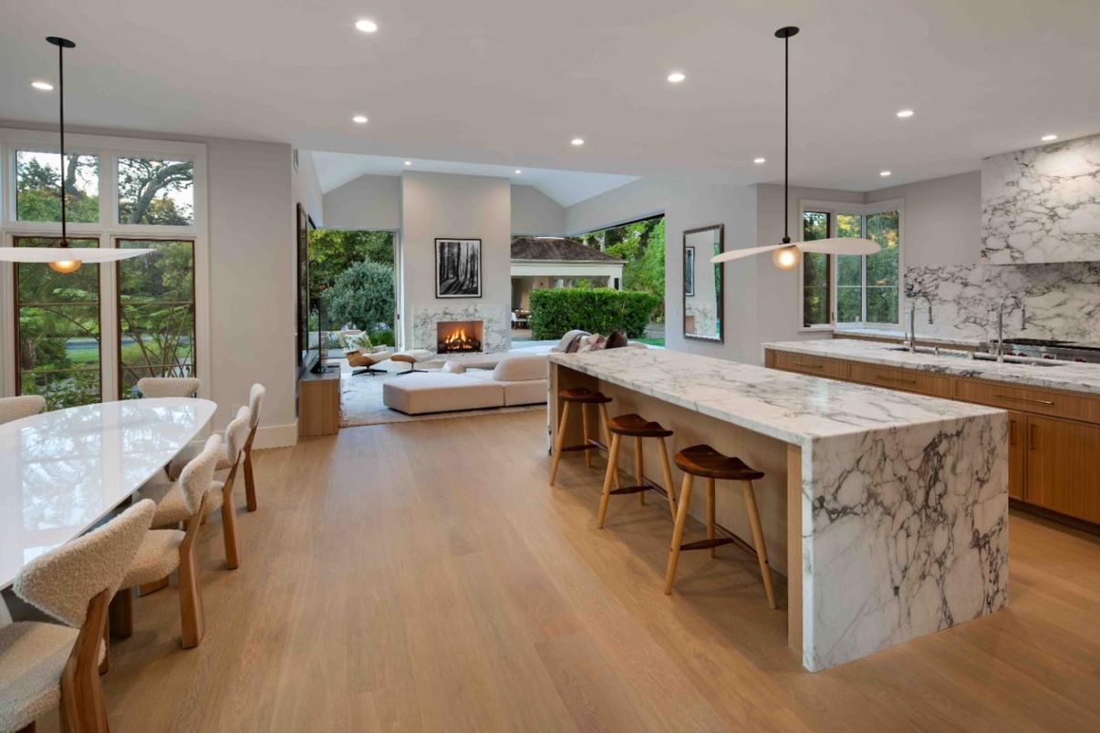 Dining room, Fireplace, Interior, Kitchen, Living room, Marble Walls, Pendant Lights, Recessed Lighting, Wood Texture Flooring