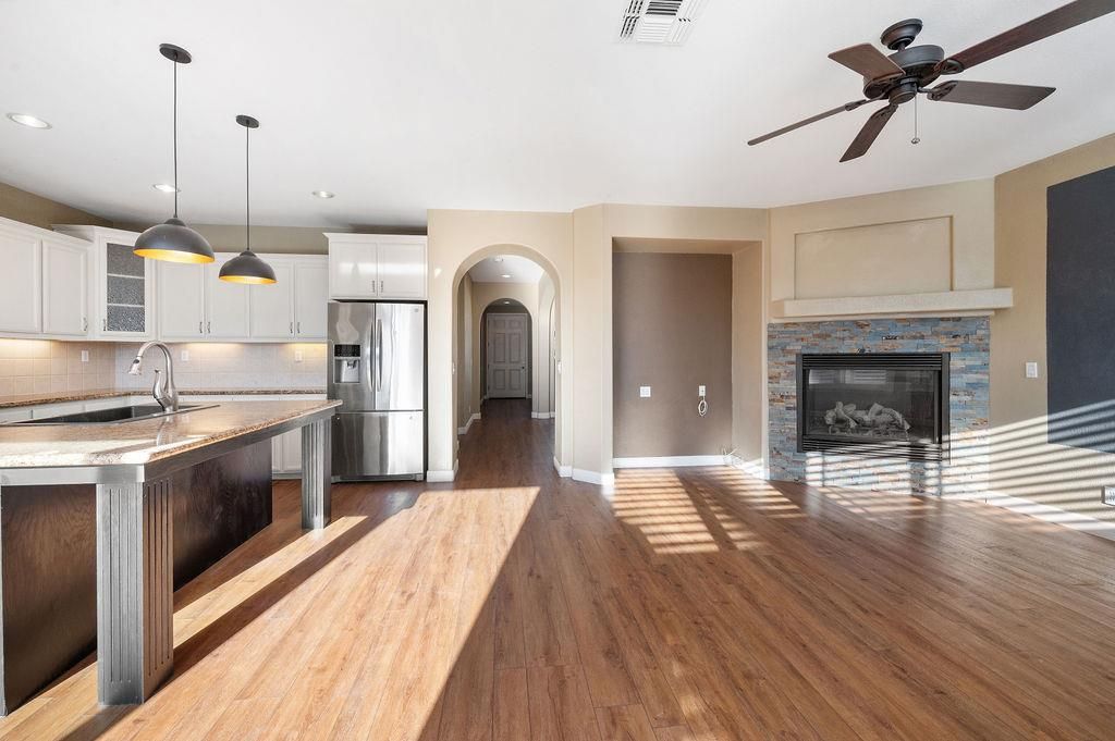 Fireplace, Interior, Kitchen, Pendant Lights, Recessed Lighting, Stainless Steel Appliances, Wood Texture Flooring