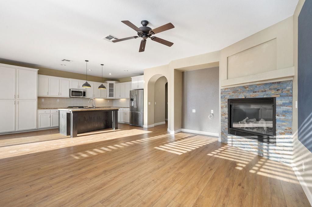 Fireplace, Interior, Kitchen, Pendant Lights, Recessed Lighting, Stainless Steel Appliances, Wood Texture Flooring