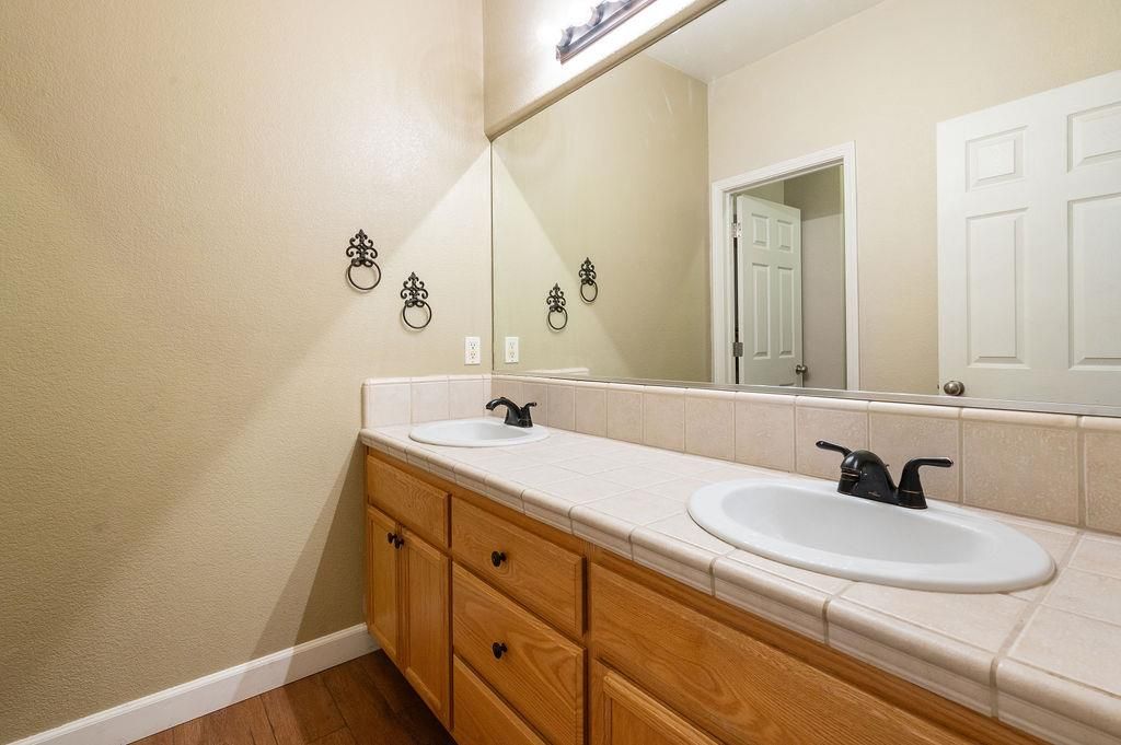 Bathroom, Dual Sink Vanities, Interior, Tile Countertops, Wood Texture Flooring