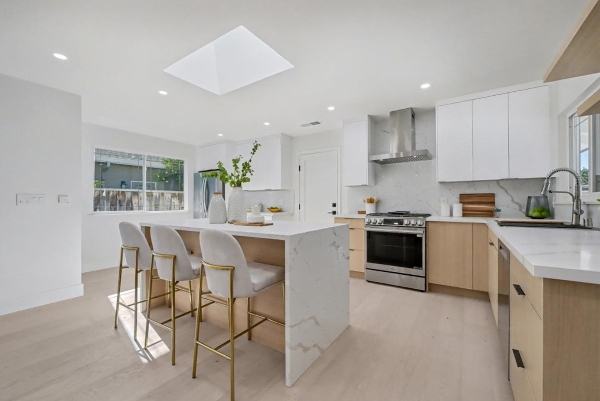 Interior, Kitchen, Marble Walls, Recessed Lighting, Stainless Steel Appliances, Wood Texture Flooring