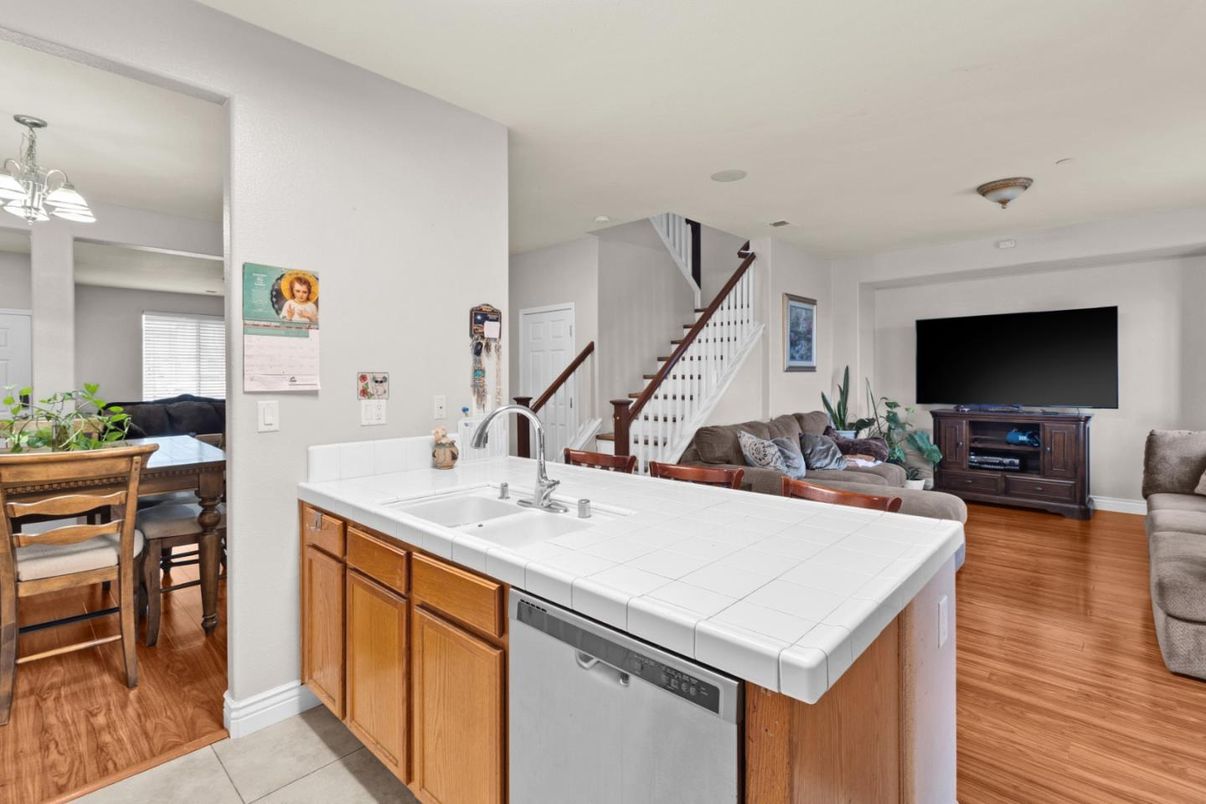 Dining room, Interior, Kitchen, Living room, Recessed Lighting, Tile Countertops, Wood Texture Flooring