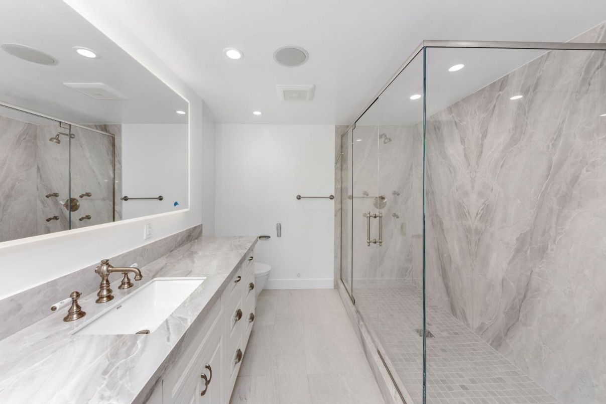 Bathroom, Dual Sink Vanities, Glass Shower, Interior, Marble Walls, Recessed Lighting