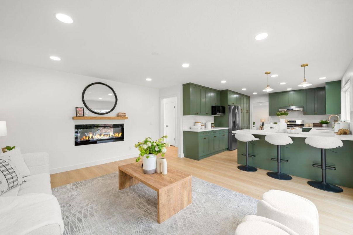 Fireplace, Interior, Kitchen, Living room, Pendant Lights, Recessed Lighting, Stainless Steel Appliances, Wood Texture Flooring