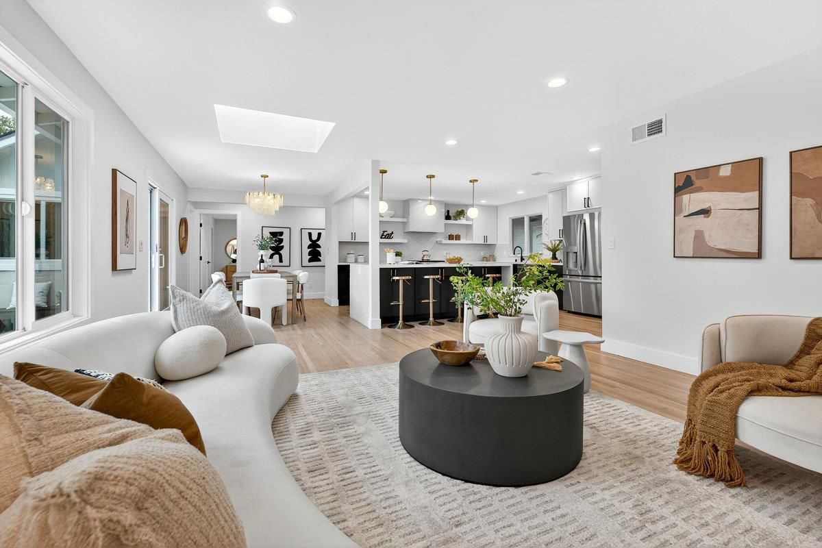 Chandelier, Dining room, Interior, Kitchen, Living room, Pendant Lights, Recessed Lighting, Stainless Steel Appliances, Wood Texture Flooring