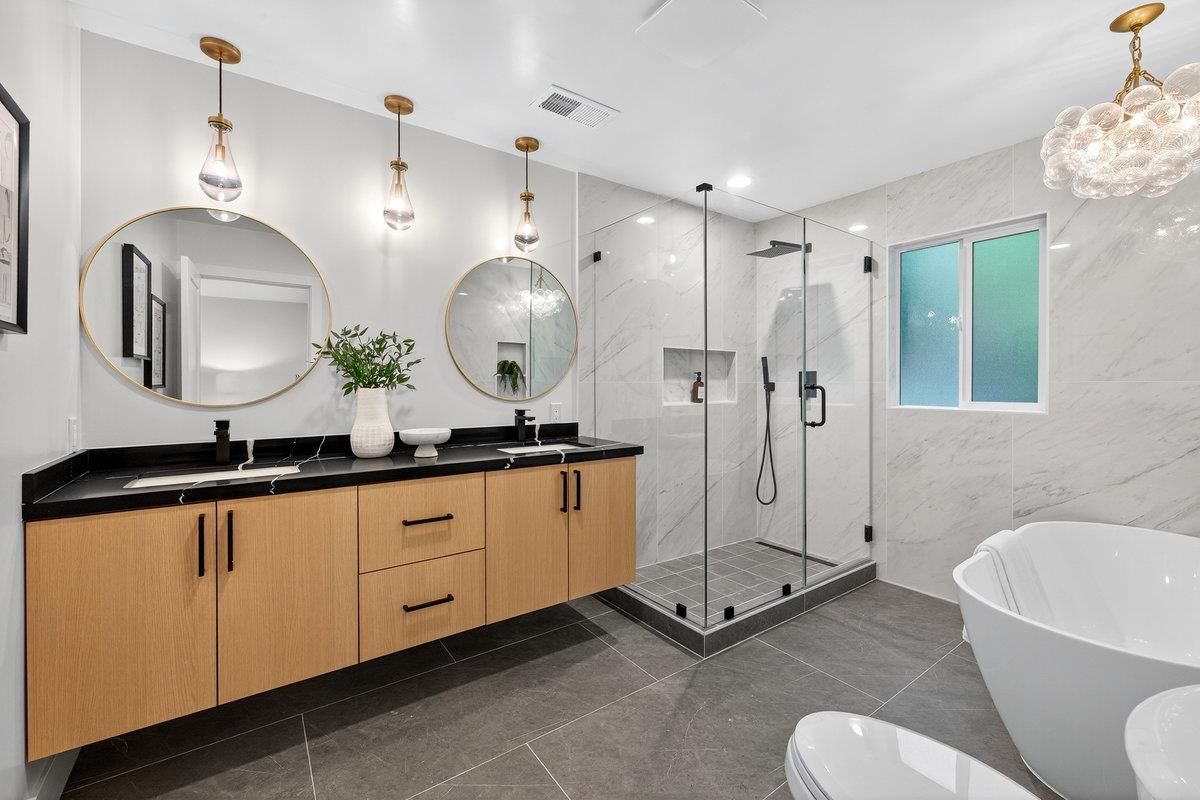 Bathroom, Dual Sink Vanities, Free Standing Baths, Glass Shower, Interior, Marble Walls, Pendant Lights, Recessed Lighting