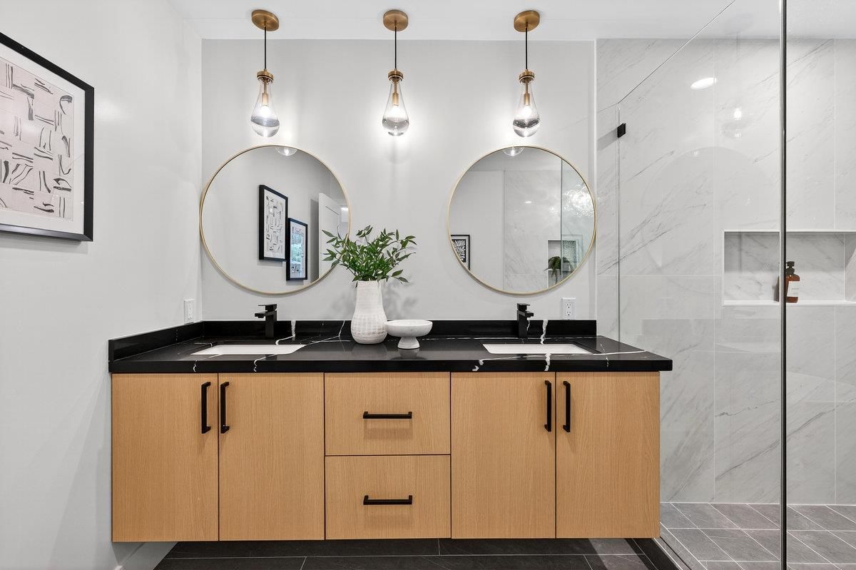 Bathroom, Dual Sink Vanities, Glass Shower, Interior, Marble Walls, Pendant Lights, Recessed Lighting
