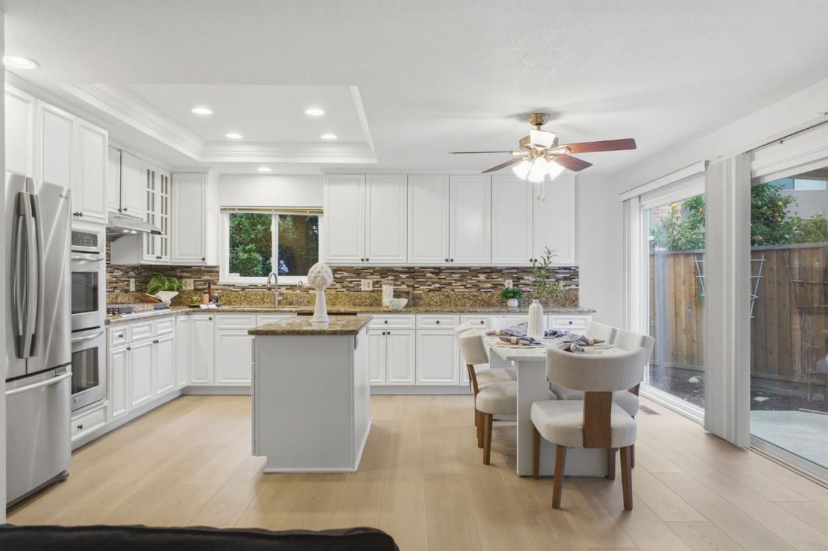 Dining room, Interior, Kitchen, Recessed Lighting, Stainless Steel Appliances, Wood Texture Flooring