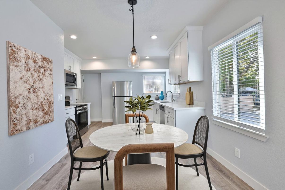 Dining room, Interior, Kitchen, Pendant Lights, Recessed Lighting, Stainless Steel Appliances, Wood Texture Flooring