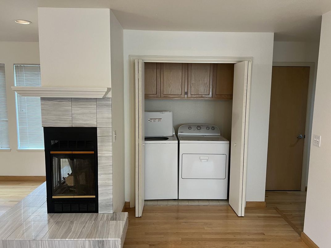 Fireplace, Interior, Recessed Lighting, Utility Closets, Washer, Wood Texture Flooring